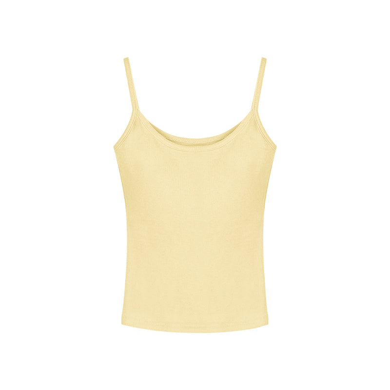 A young woman is dressed in a bright yellow camisole vest, perfect for the warm summer weather.