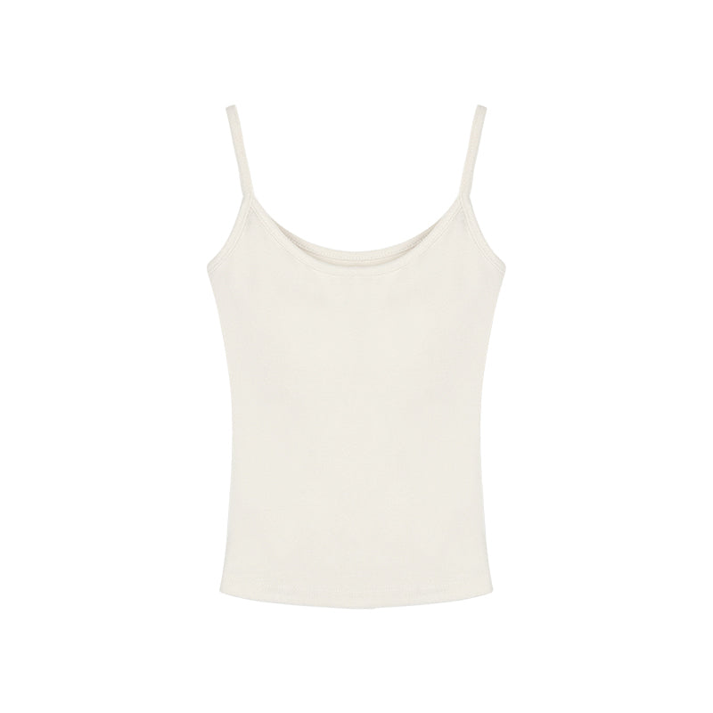 A young woman is dressed in a bright yellow camisole vest, perfect for the warm summer weather.