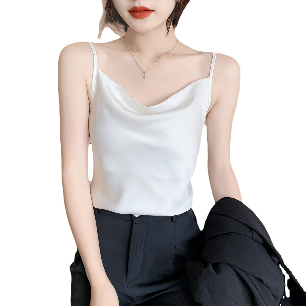 Real shot of a small camisole vest for women, with a suit inside, a white v-neck bottoming shirt.