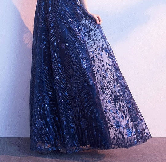 Absolutely! Here's a full description of a spring fashion simple and generous banquet long dress that’s elegant