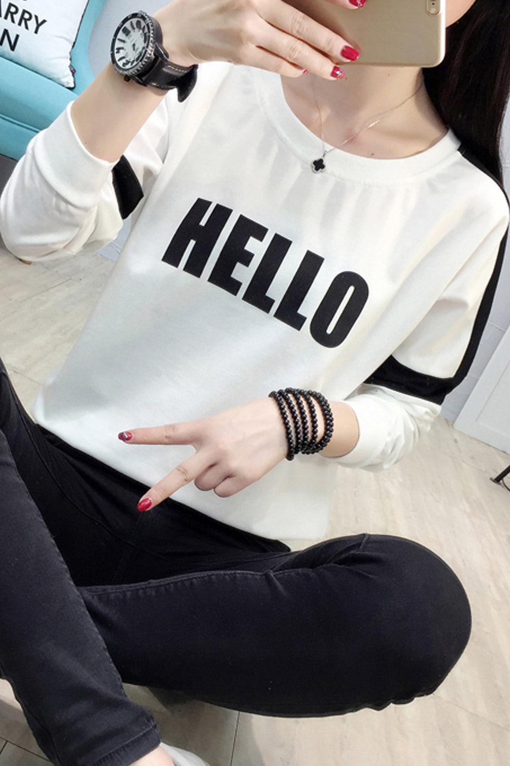 Women Loose Long Sleeved Graphic Printed Top