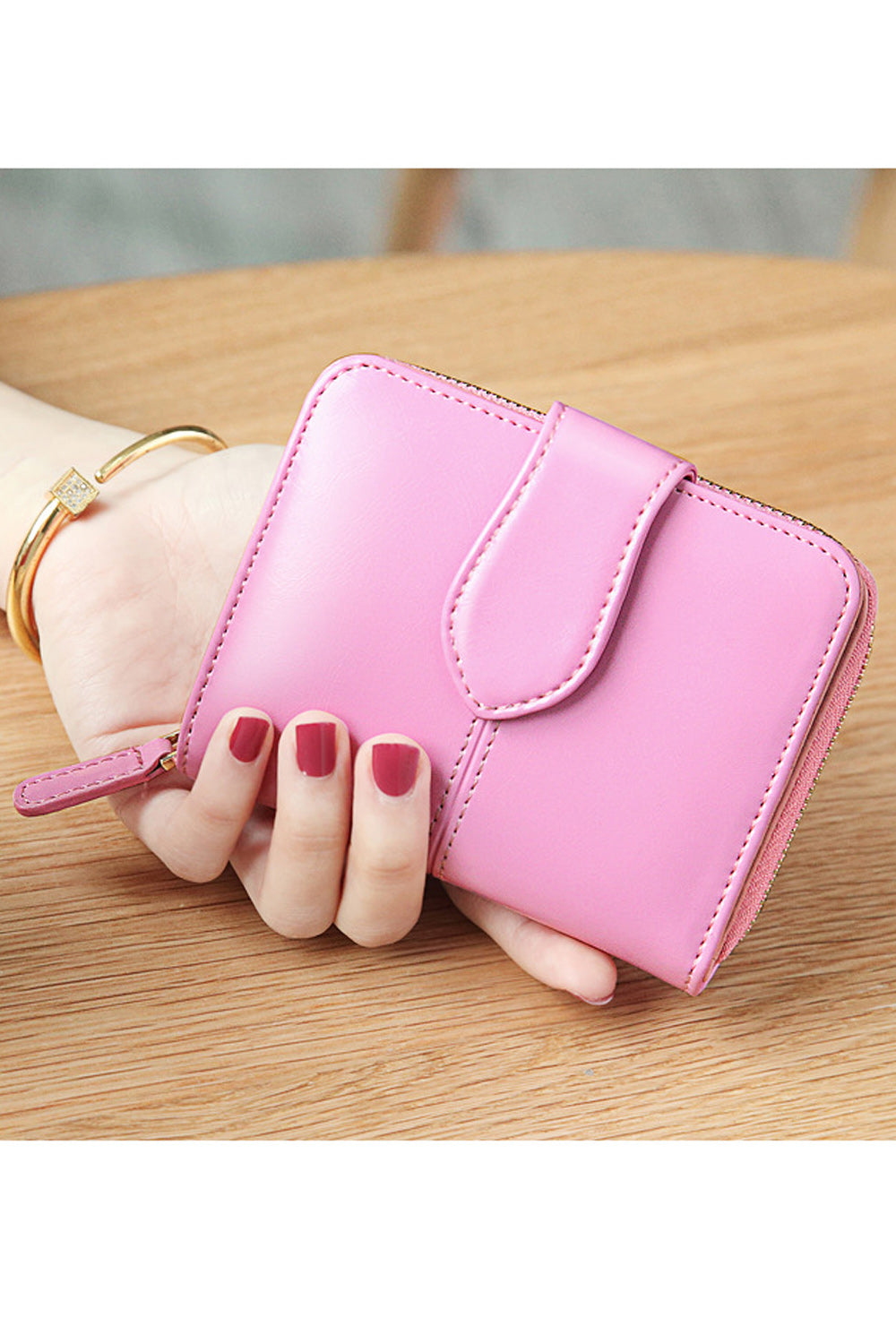 This women wallet is very cute and small in size. It has sections to keep cash and cards. Secured with zipper and flap button cl