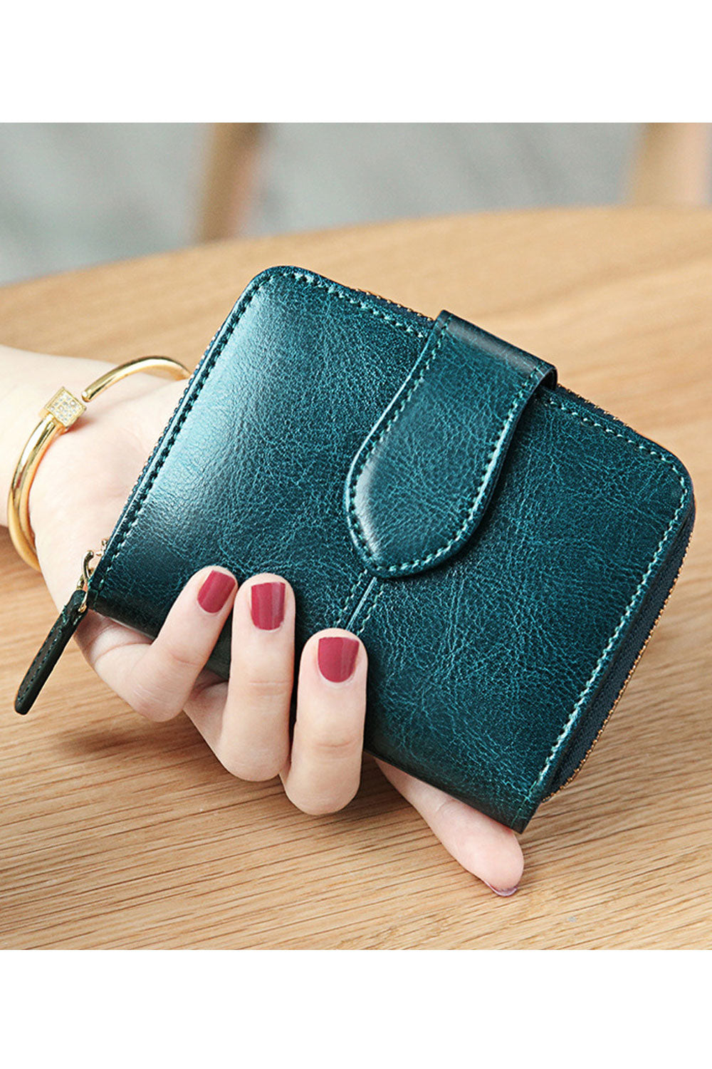 This women wallet is very cute and small in size. It has sections to keep cash and cards. Secured with zipper and flap button cl